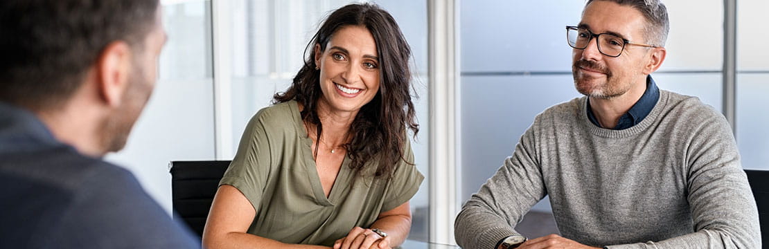 Couple consulting tax specialist, financial advisor.